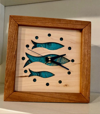 Schooling Fish Clock